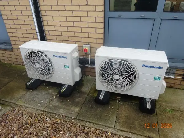 Two outdoor units on anti-vibration mounts
