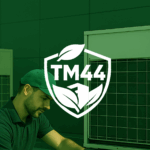 TM44 air conditioning inspection – certified engineer checking commercial HVAC unit for UK compliance.